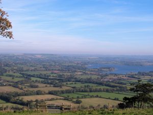 Image overlooking Chew Valley Lake with fields in the foreground