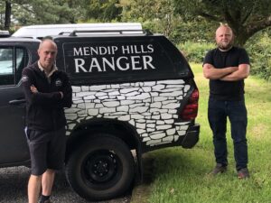 Joe Taylor MTL Ltd donating money to Jim Hardcastle for the Mendip Hills Fund for tree planting.