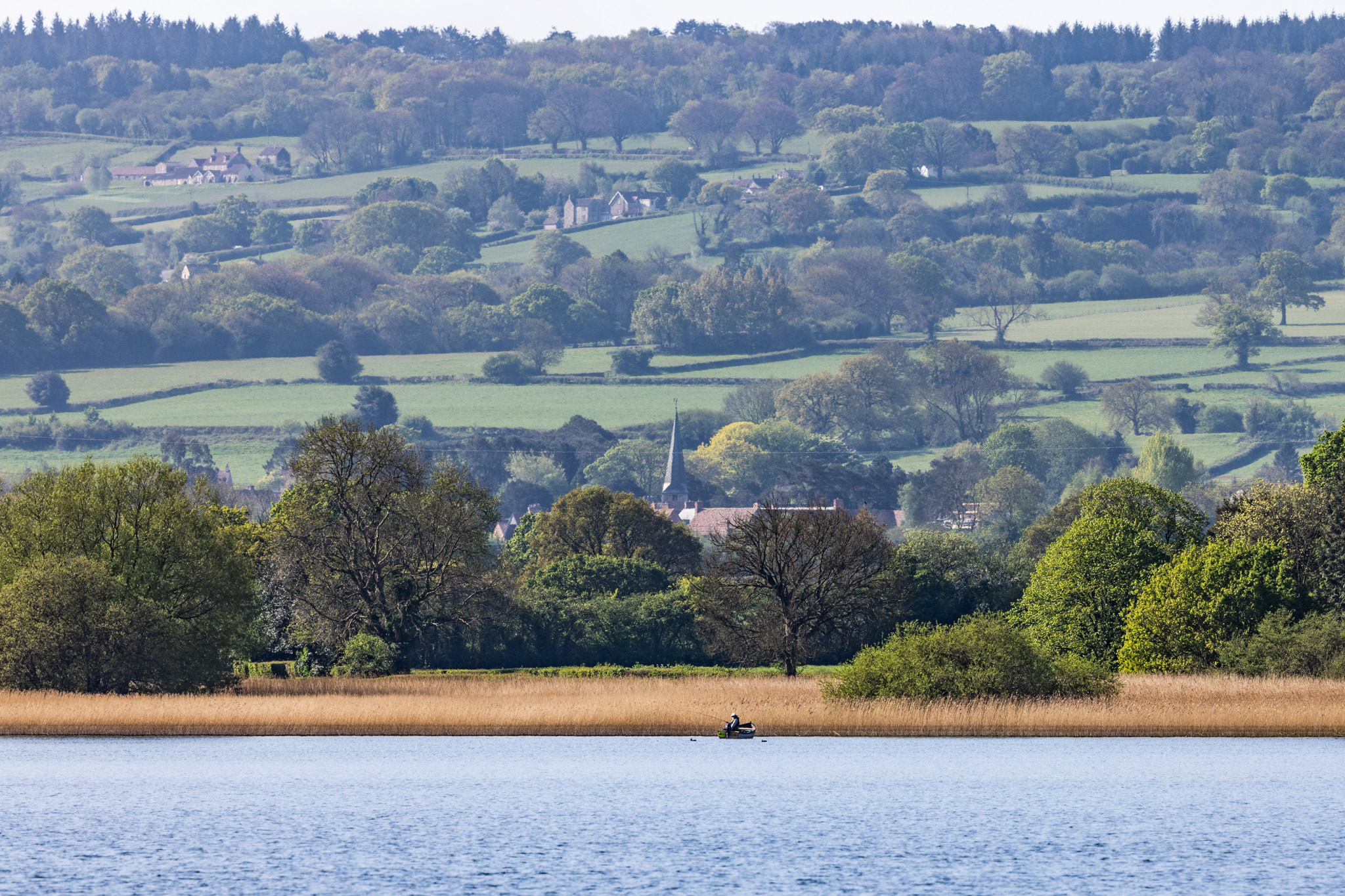 Across Chew Valley Lake to the northern slopes of the Mendip Hills